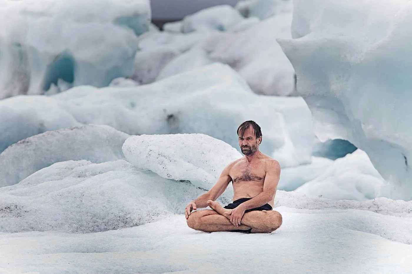 Wim Hof meditating in snow